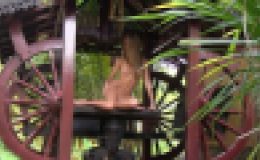 Blonde Teen Posing Nude in a Circle on the Wall